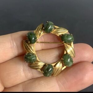 Vintage gold filled wreath brooch with cabochon jade and golden leaves